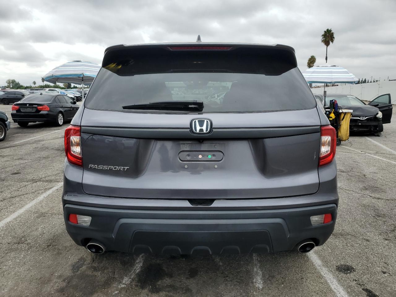 2021 Honda Passport Exl VIN: 5FNYF7H51MB009937 Lot: 81885545
