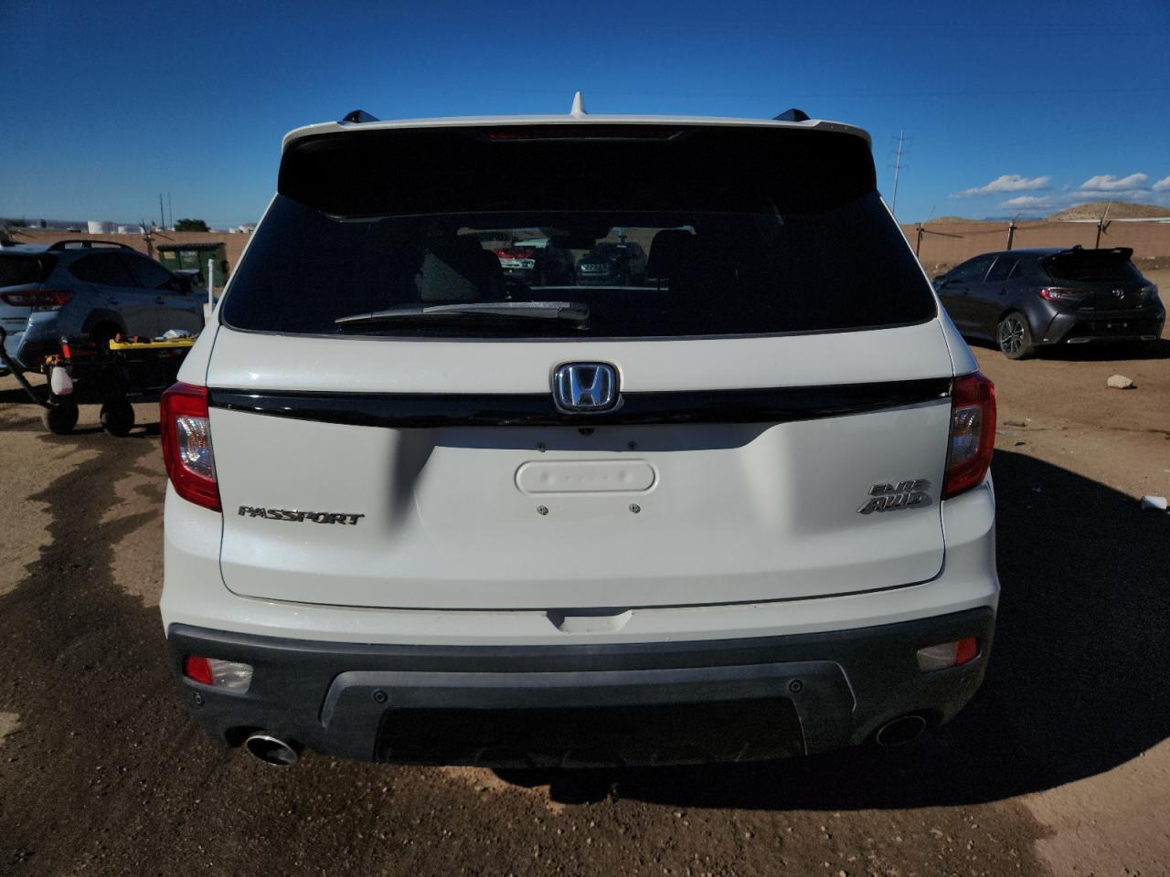 2020 Honda Passport Elite VIN: 5FNYF8H03LB002898 Lot: 83825895