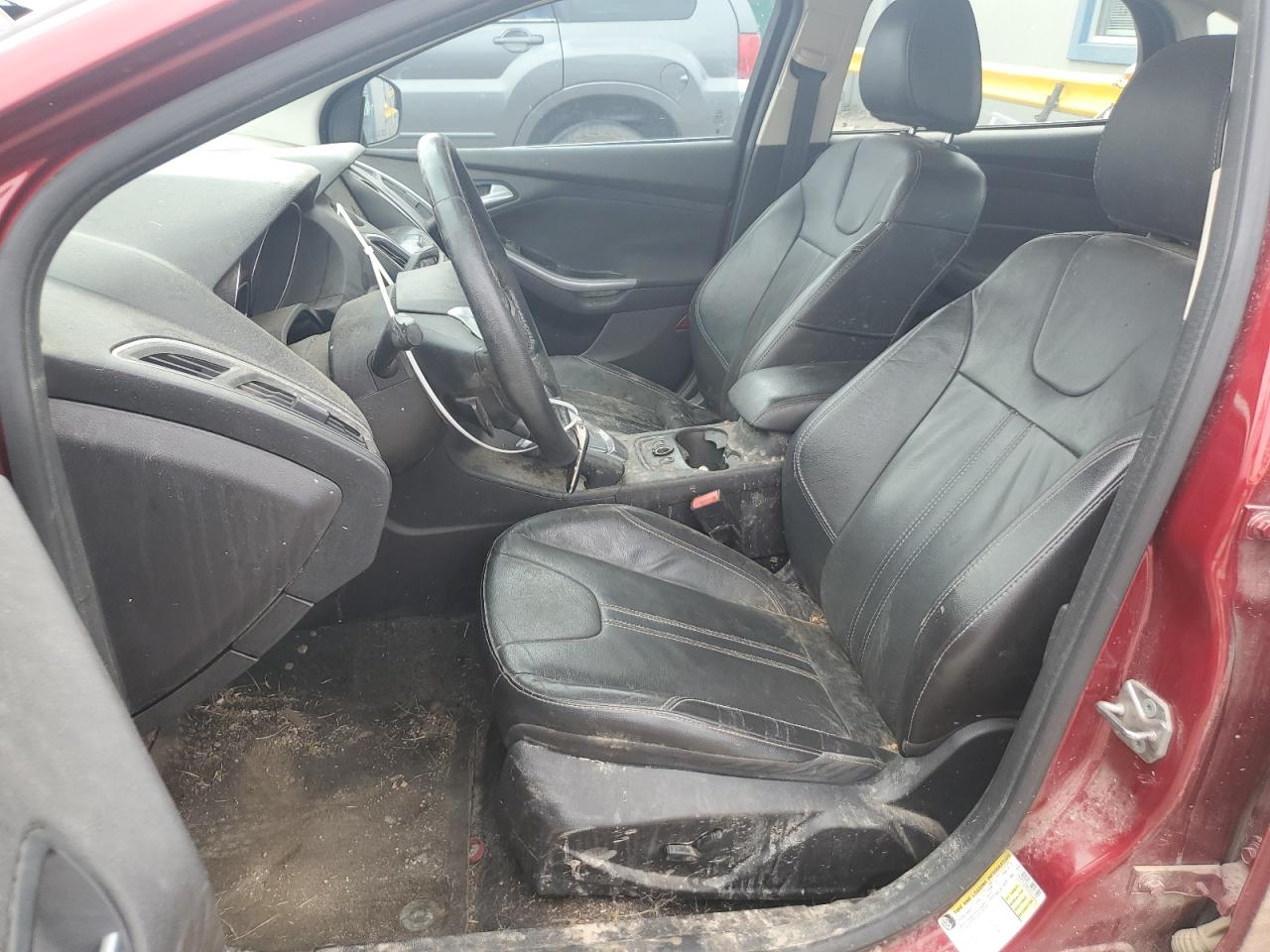 2014 Ford Focus Titanium VIN: 1FADP3J28EL431275 Lot: 83947635