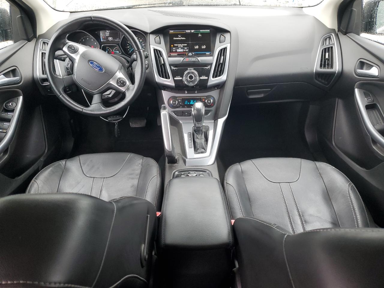 2012 Ford Focus Titanium VIN: 1FAHP3N26CL412510 Lot: 84207115