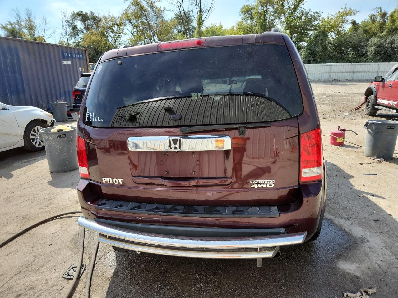 2010 Honda Pilot Touring VIN: 5FNYF4H90AB034390 Lot: 71918485
