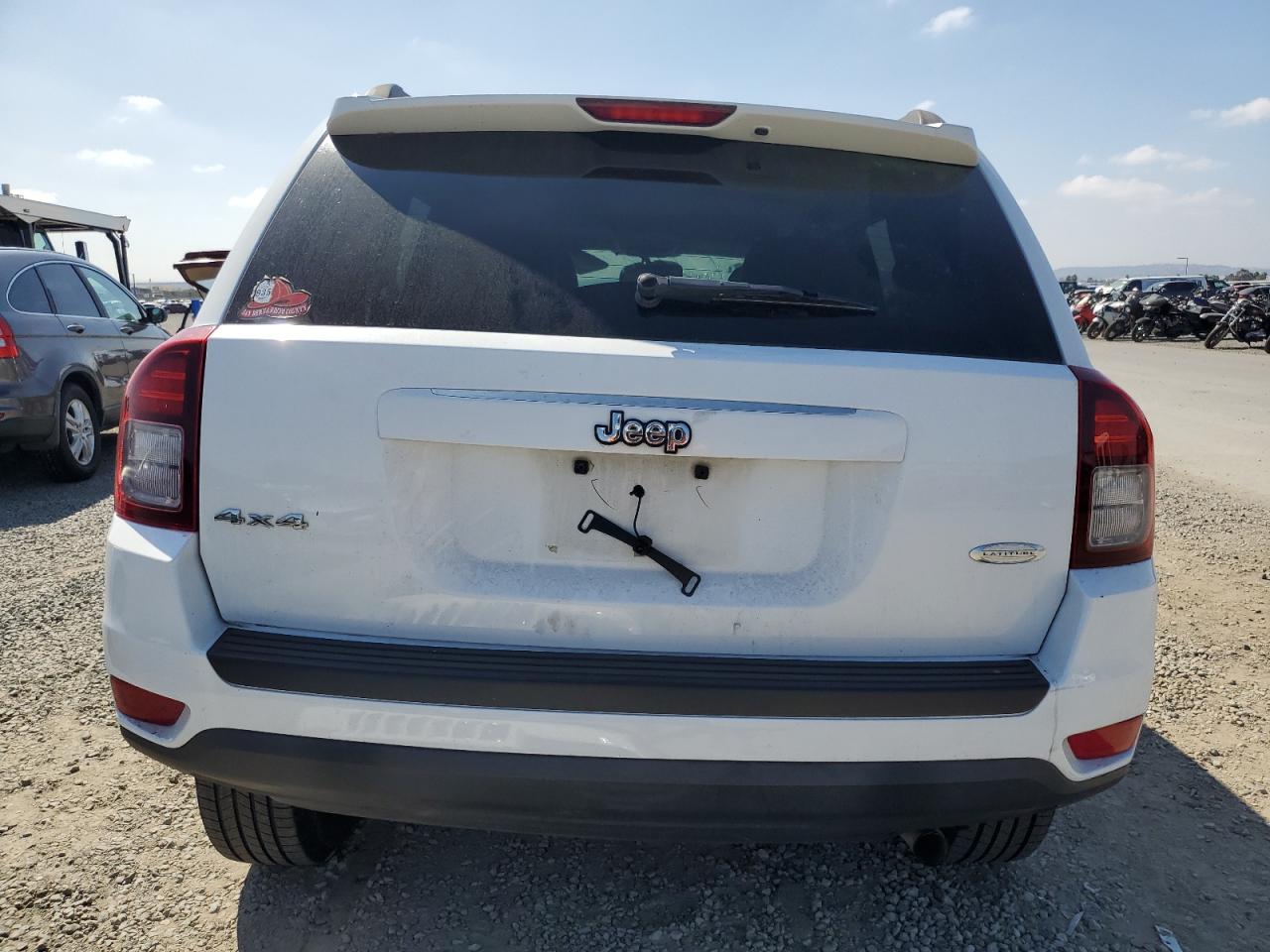 2016 Jeep Compass Latitude VIN: 1C4NJDEB7GD779744 Lot: 84400465