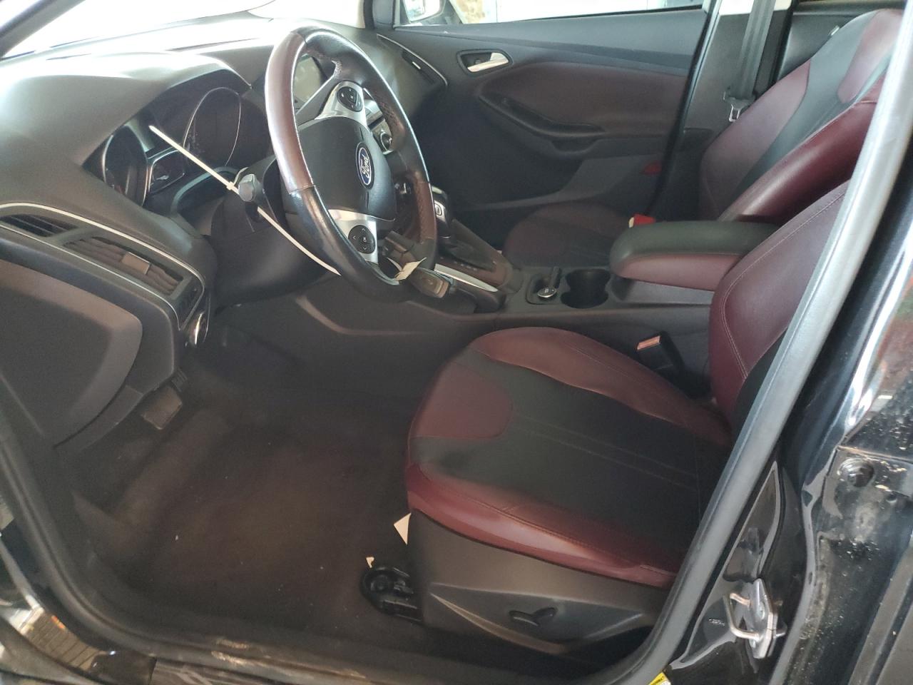 2012 Ford Focus Titanium VIN: 1FAHP3N21CL290526 Lot: 81444685