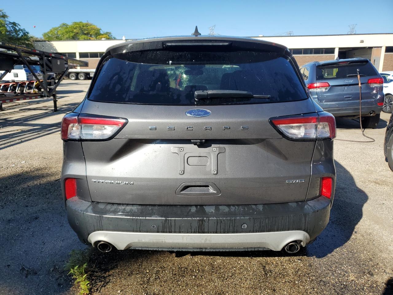 2021 Ford Escape Titanium VIN: 1FMCU9J99MUA57746 Lot: 84167555