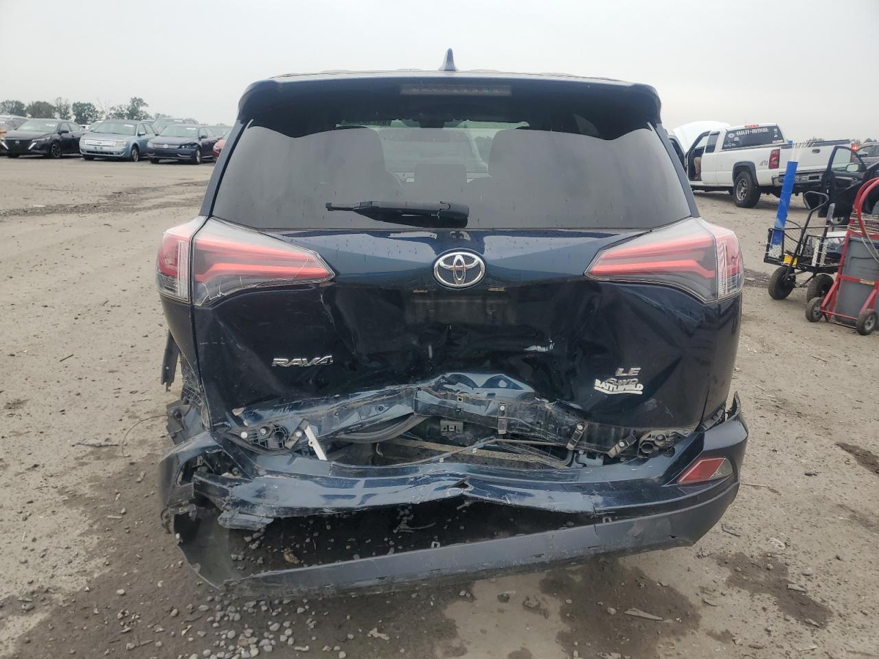 2018 Toyota Rav4 Le VIN: JTMBFREV8JJ234558 Lot: 86083955