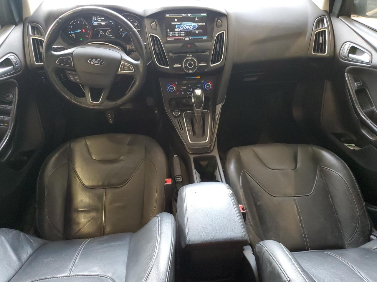 2015 Ford Focus Titanium VIN: 1FADP3J20FL231220 Lot: 80630245