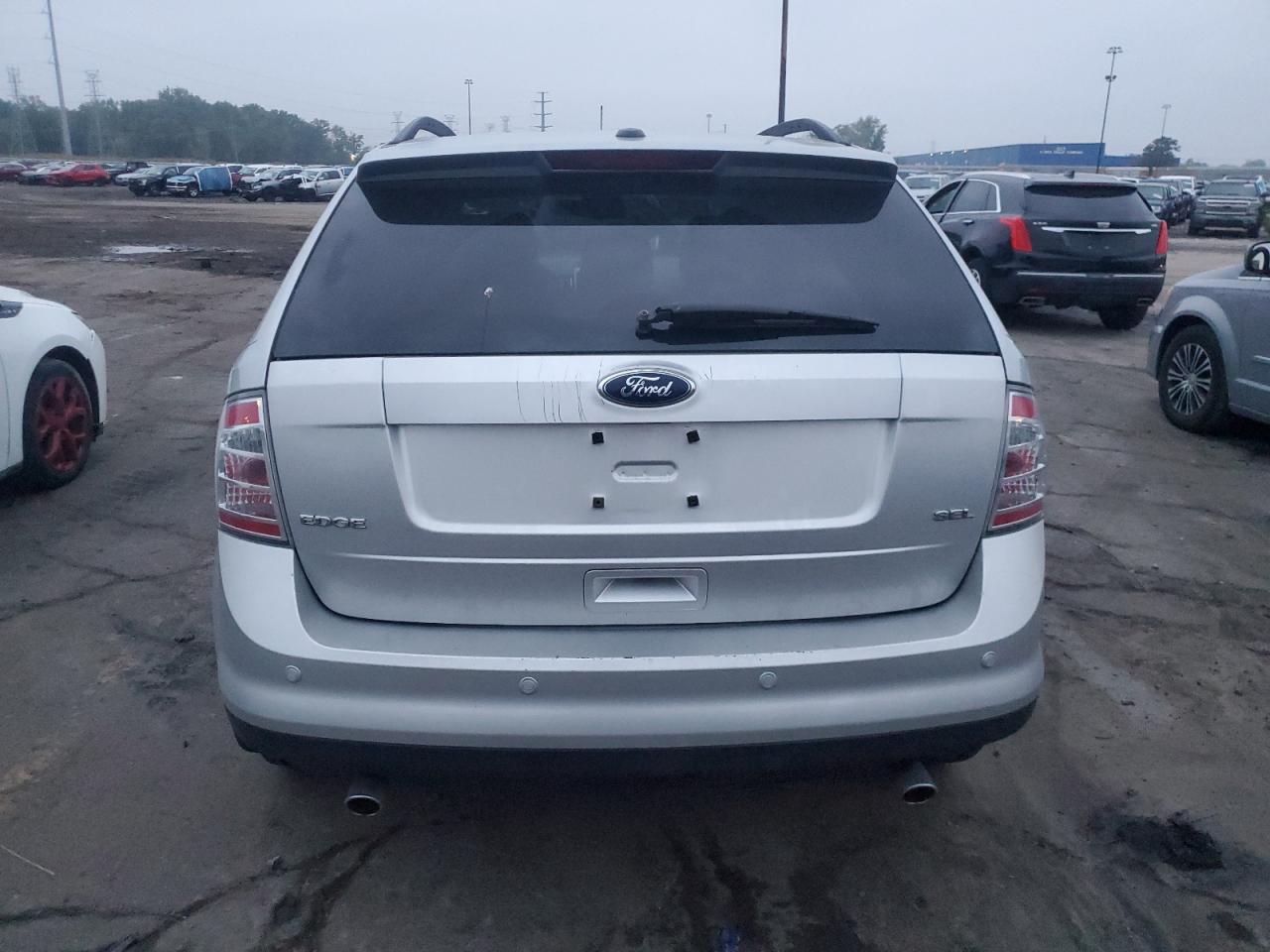 2009 Ford Edge Sel VIN: 2FMDK38C09BA34023 Lot: 83776885
