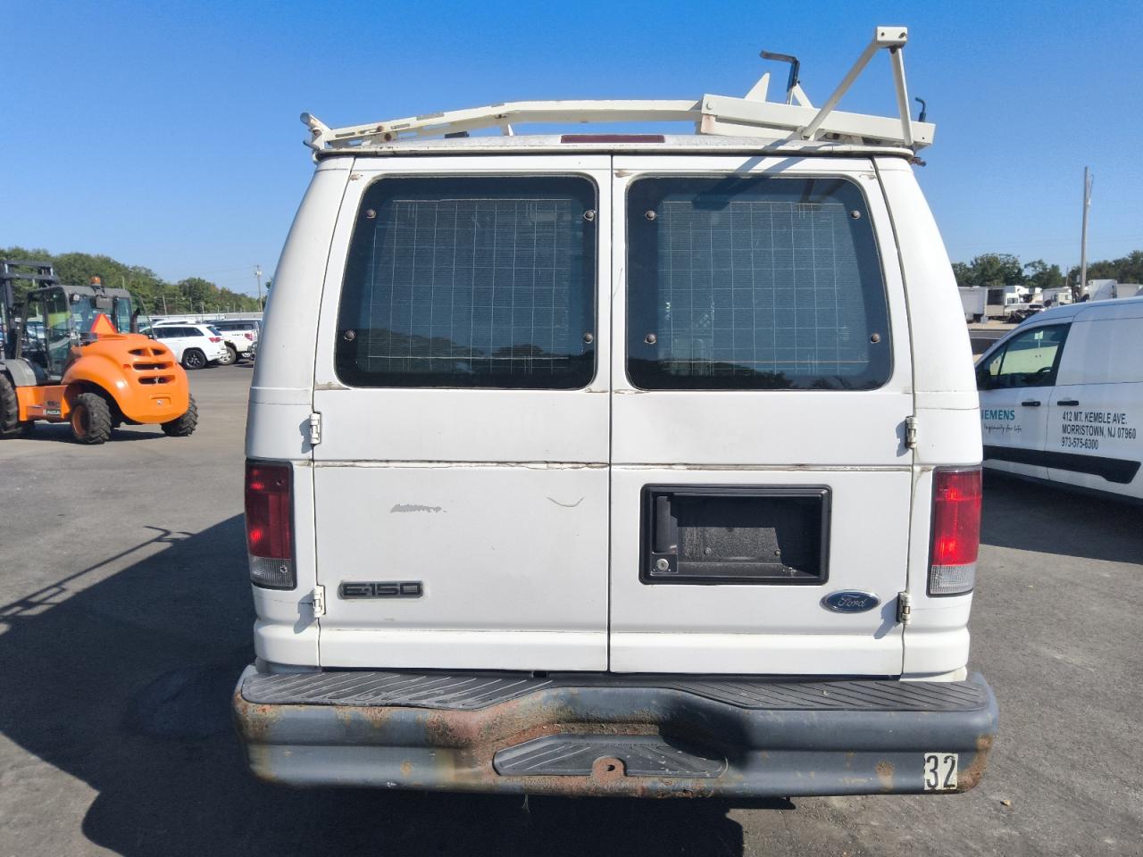 2011 Ford Econoline E150 Van VIN: 1FTNE1EW7BDA70293 Lot: 71697475