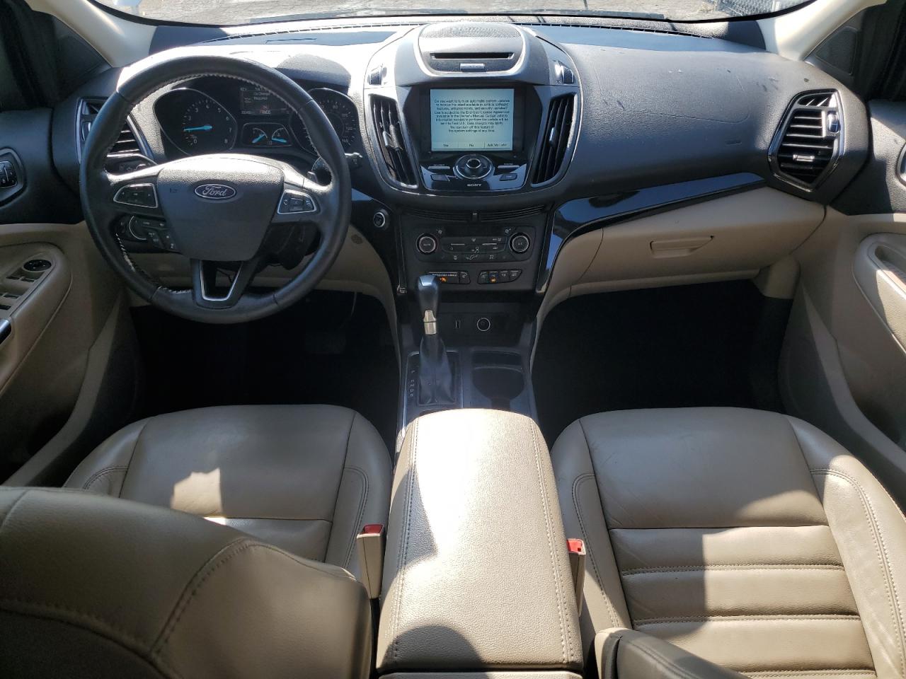 2017 Ford Escape Titanium VIN: 1FMCU9J96HUE91869 Lot: 80744795