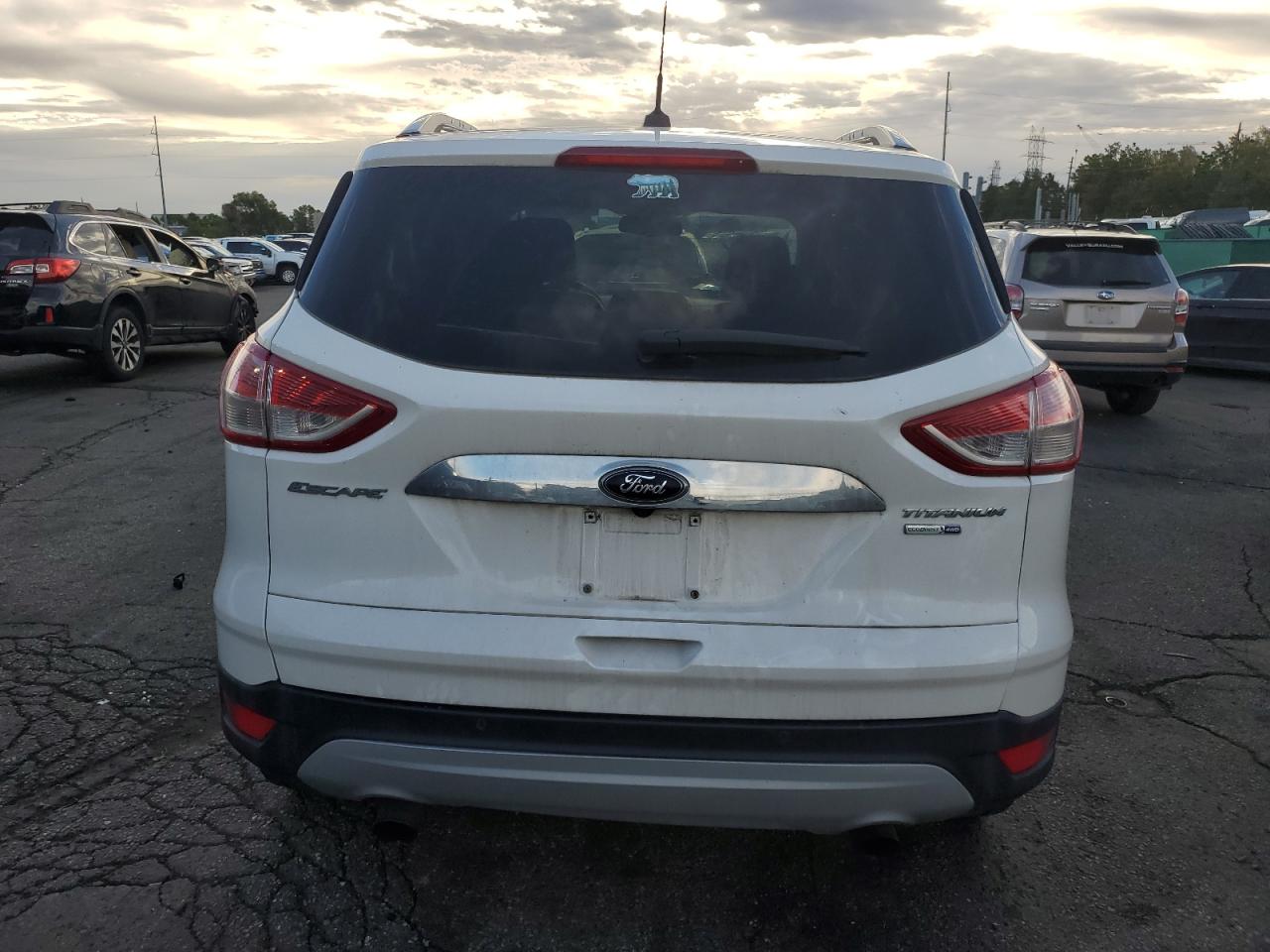 2016 Ford Escape Titanium VIN: 1FMCU9J92GUC39857 Lot: 80521235