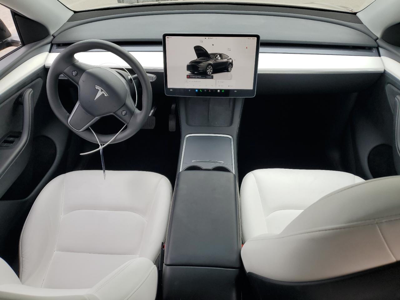 2023 Tesla Model Y VIN: 7SAYGDEE0PA184880 Lot: 84631205