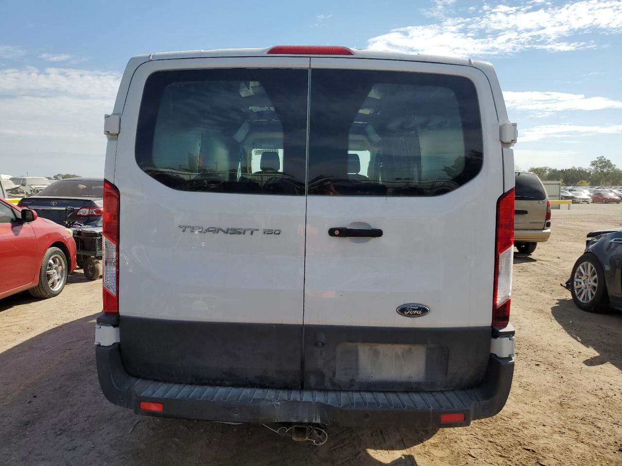 2019 Ford Transit T-150 VIN: 1FTYE1ZMXKKB39785 Lot: 84192155