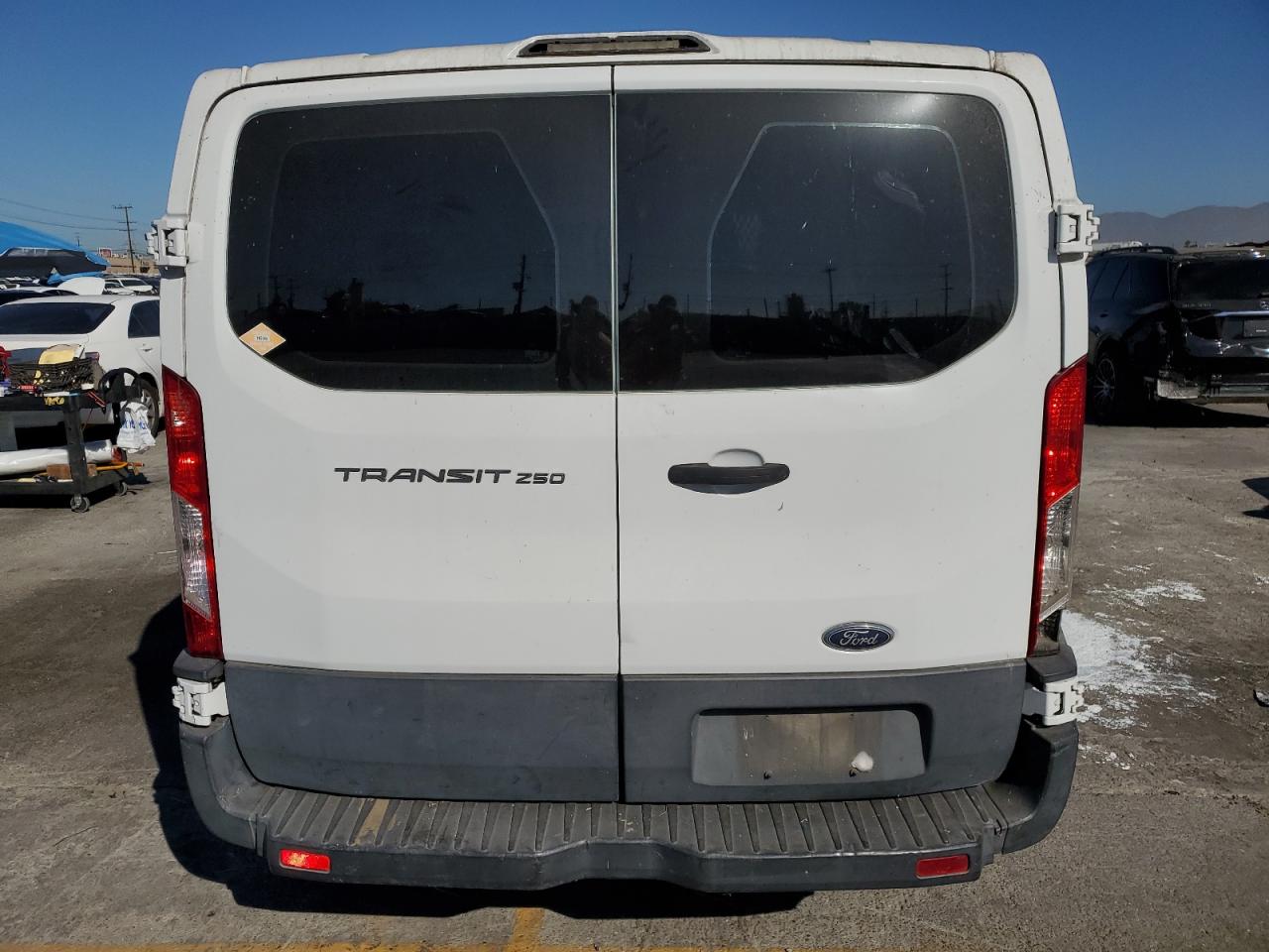 2015 Ford Transit T-250 VIN: 1FTNR1ZM2FKA56879 Lot: 71438855