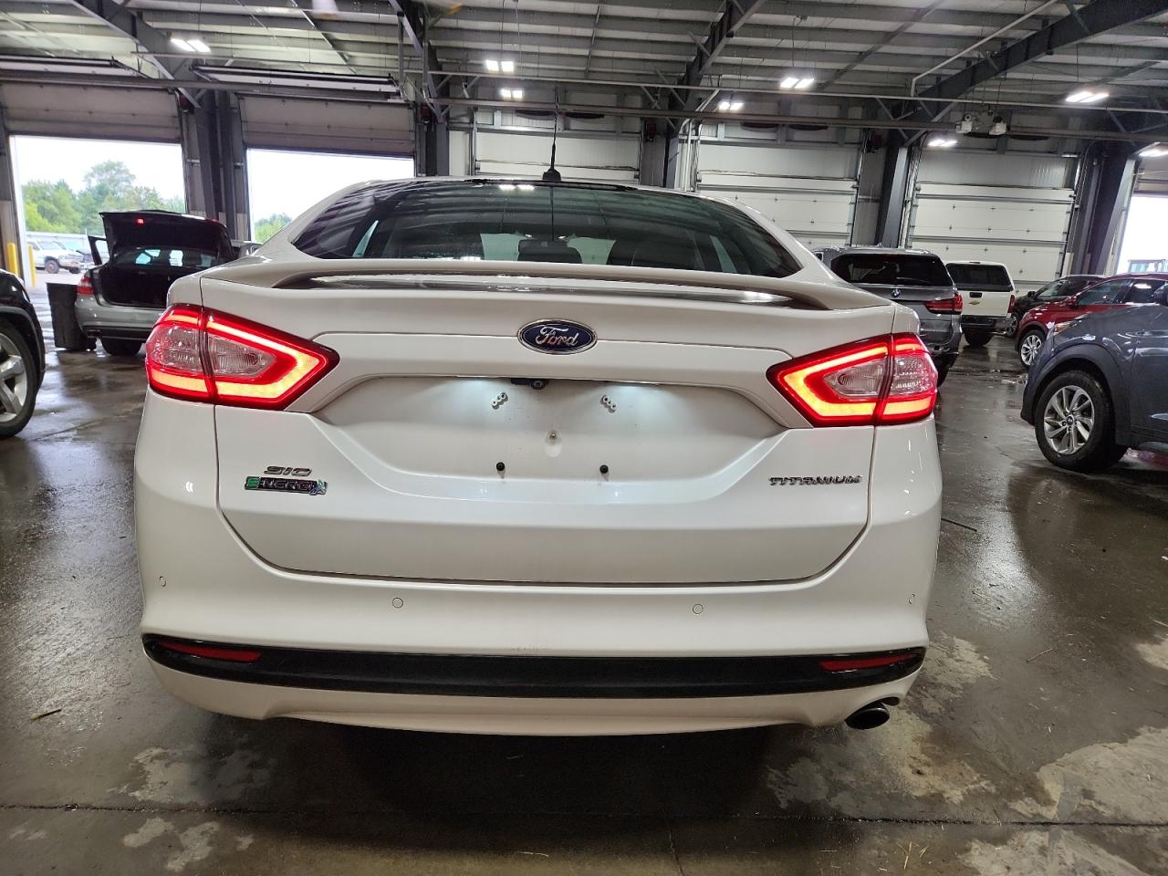 2015 Ford Fusion Titanium Phev VIN: 3FA6P0SU8FR280559 Lot: 70739355