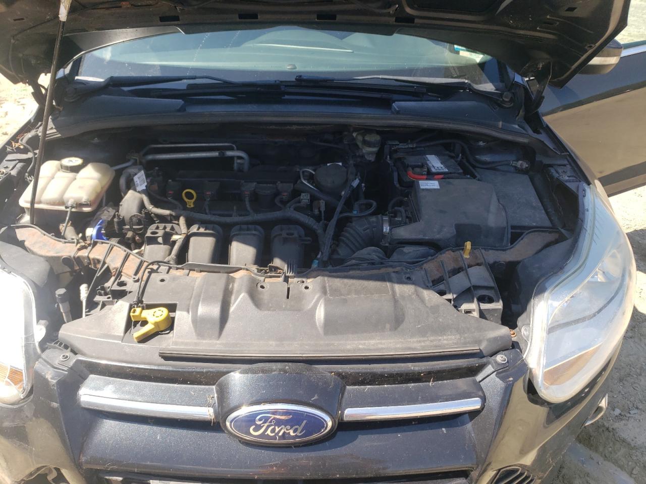 2014 Ford Focus Titanium VIN: 1FADP3J25EL201791 Lot: 71055575