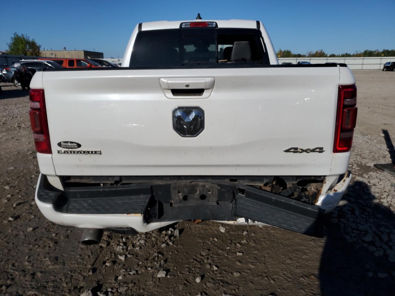 2019 Ram 1500 Laramie VIN: 1C6SRFJT7KN715557 Lot: 81608595