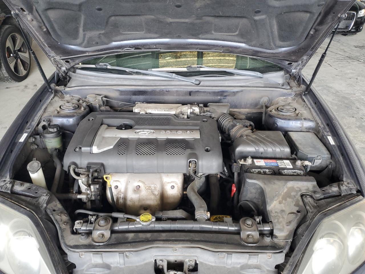 2004 Hyundai Tiburon VIN: KMHHM65D04U107131 Lot: 72101305