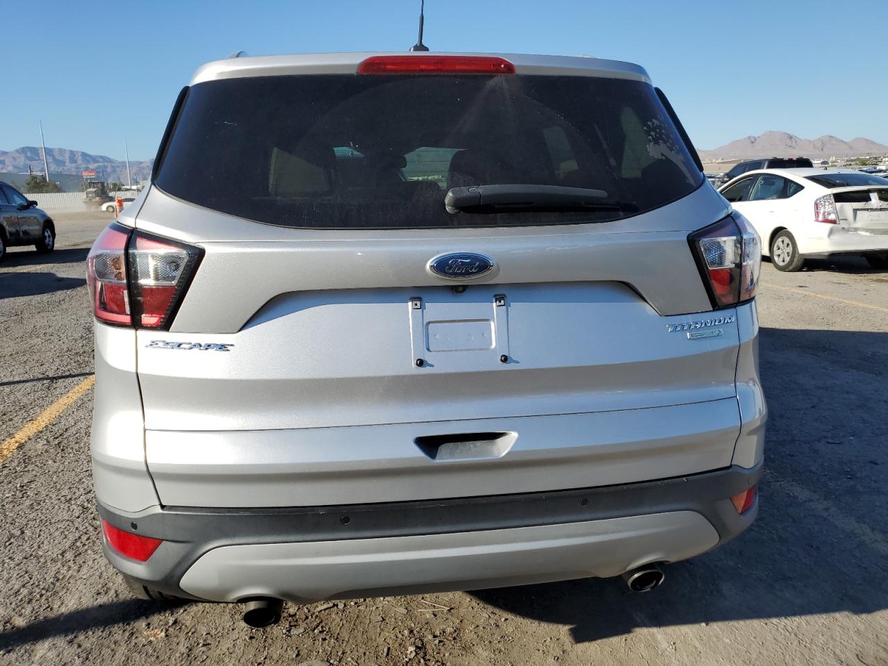 2017 Ford Escape Titanium VIN: 1FMCU0J97HUC56490 Lot: 82139255