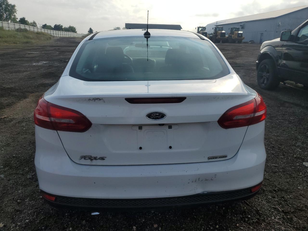 2015 Ford Focus S VIN: 1FADP3E21FL305626 Lot: 82092685