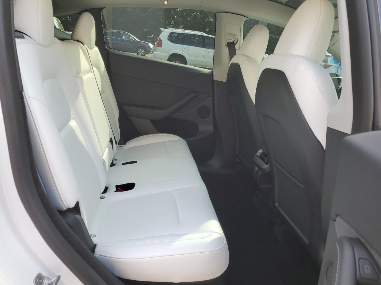 2023 Tesla Model Y VIN: 7SAYGDEF1PF705018 Lot: 82044395