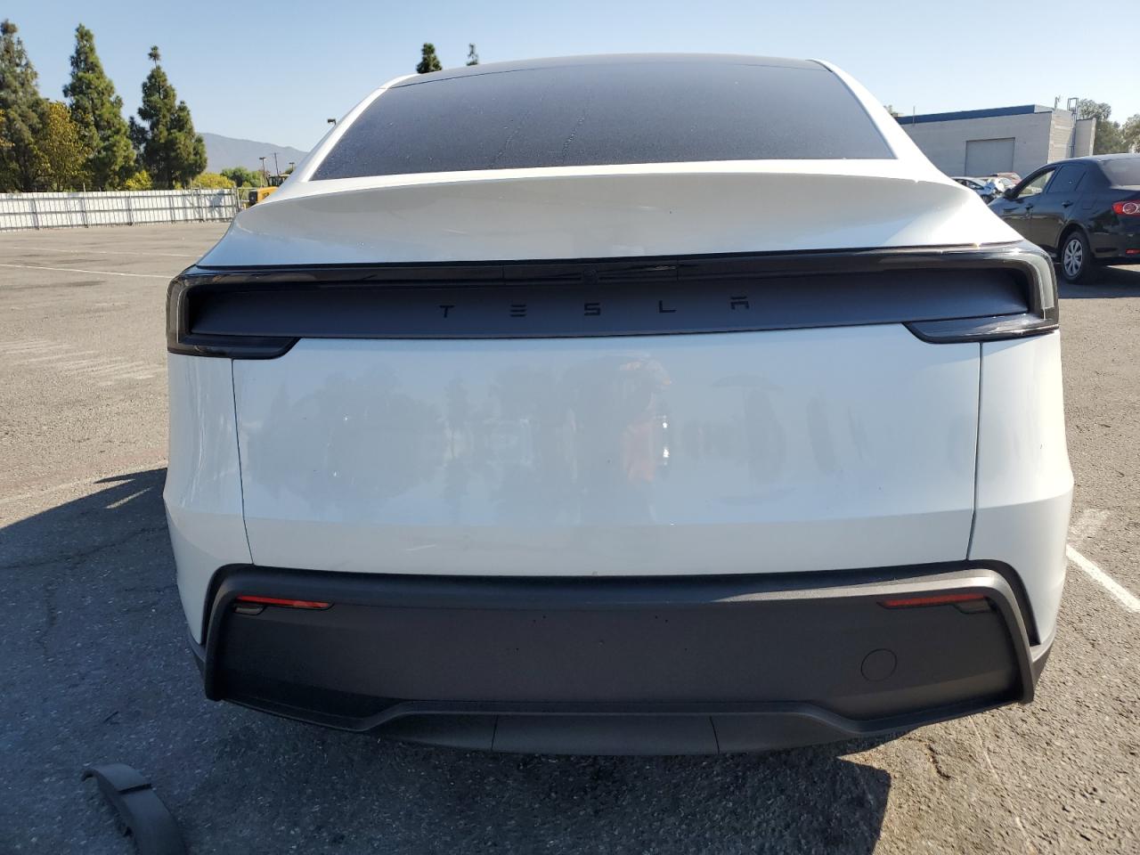 2026 Tesla Model Y VIN: 7SAYGDED1TF396692 Lot: 80906855