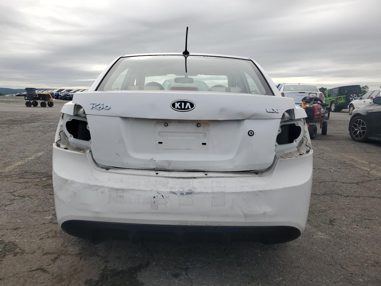 2011 Kia Rio Base VIN: KNADH4A32B6949105 Lot: 80344825