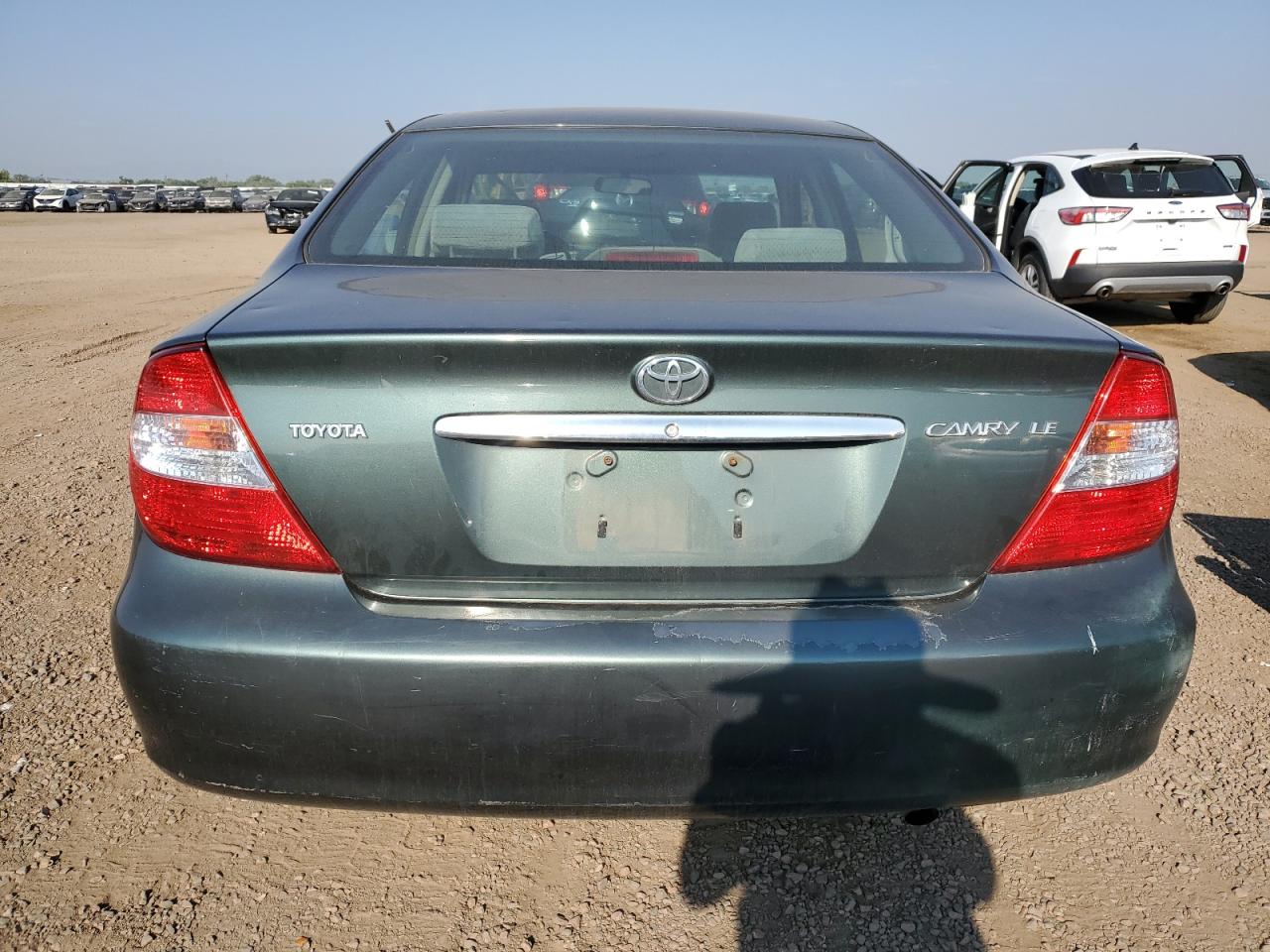 2003 Toyota Camry Le VIN: JTDBE32K030139057 Lot: 71503125