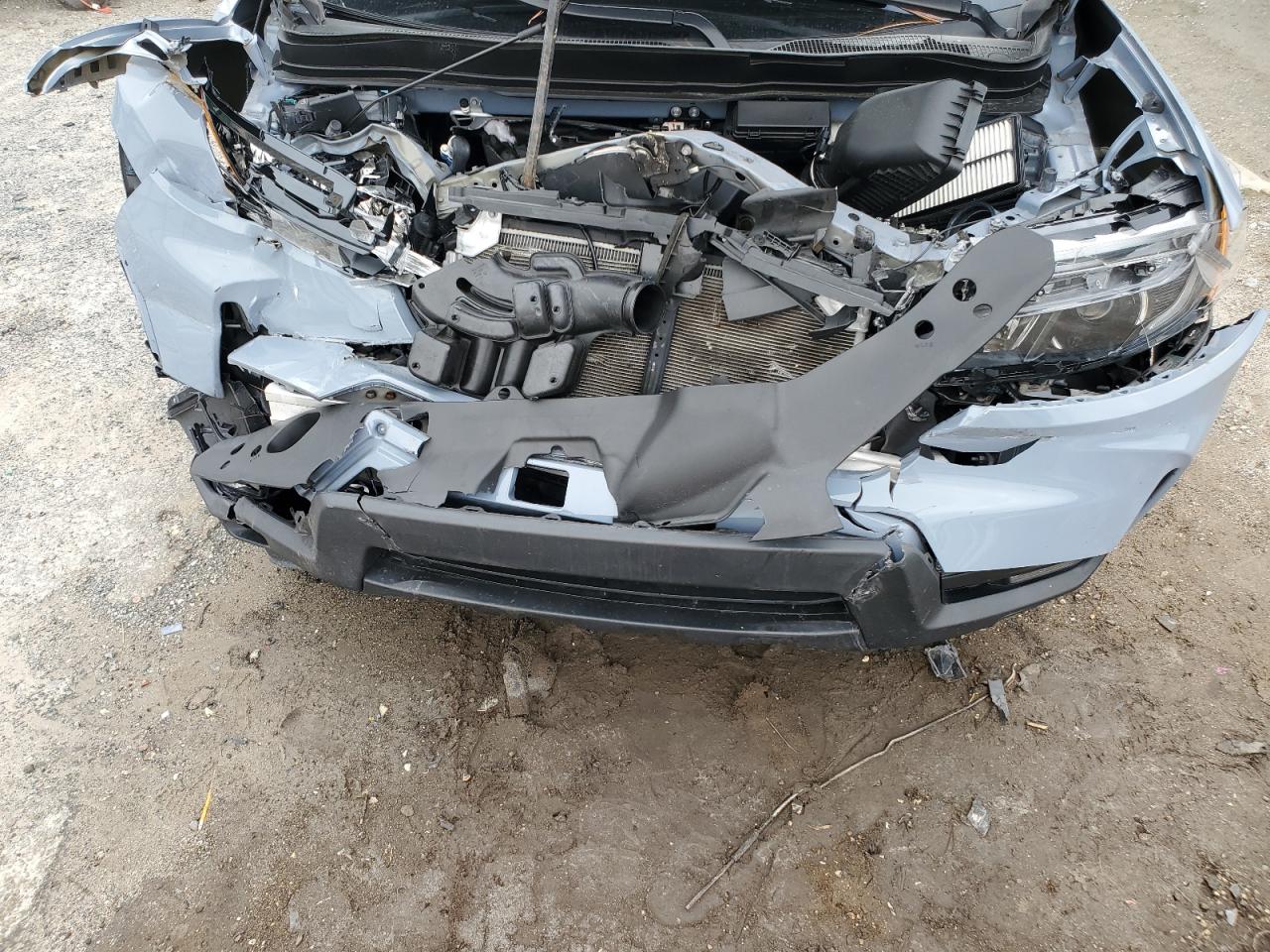 2022 Honda Passport Exl VIN: 5FNYF7H55NB007030 Lot: 84402415