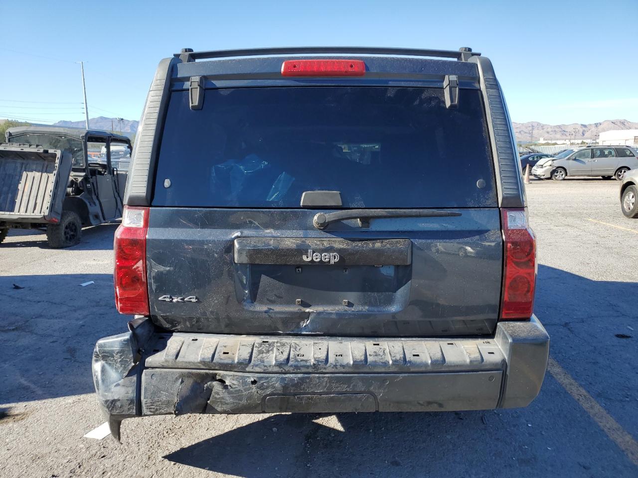 2007 Jeep Commander VIN: 1J8HG48K77C661568 Lot: 71834435