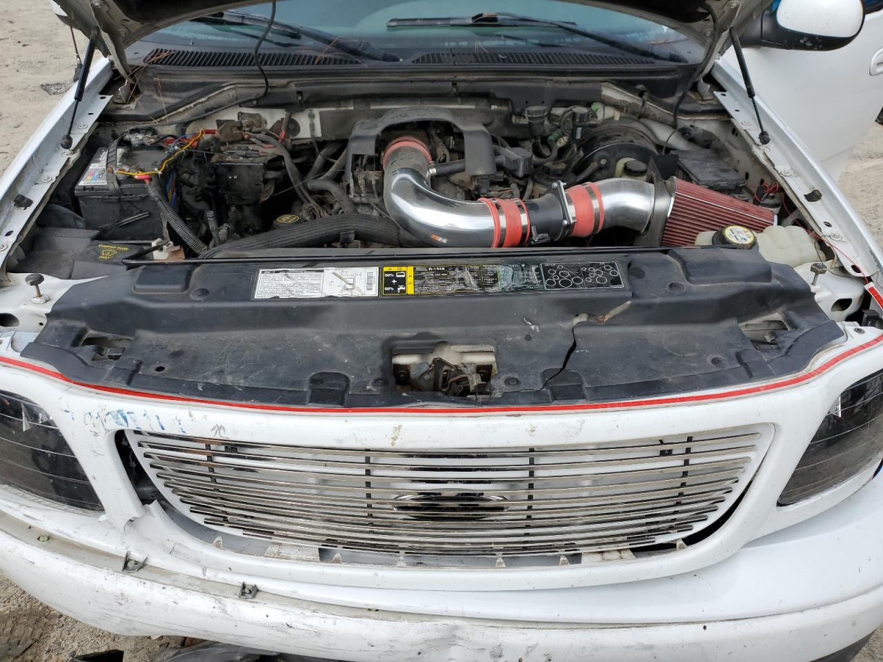 2002 Ford F150 VIN: 1FTRX18W42NA72309 Lot: 83993575