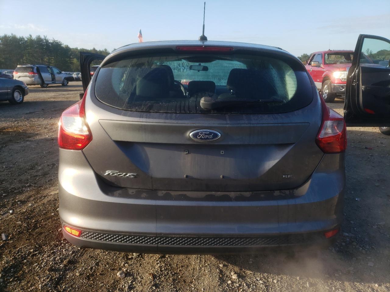 2014 Ford Focus Se VIN: 1FADP3K25EL323212 Lot: 74241464