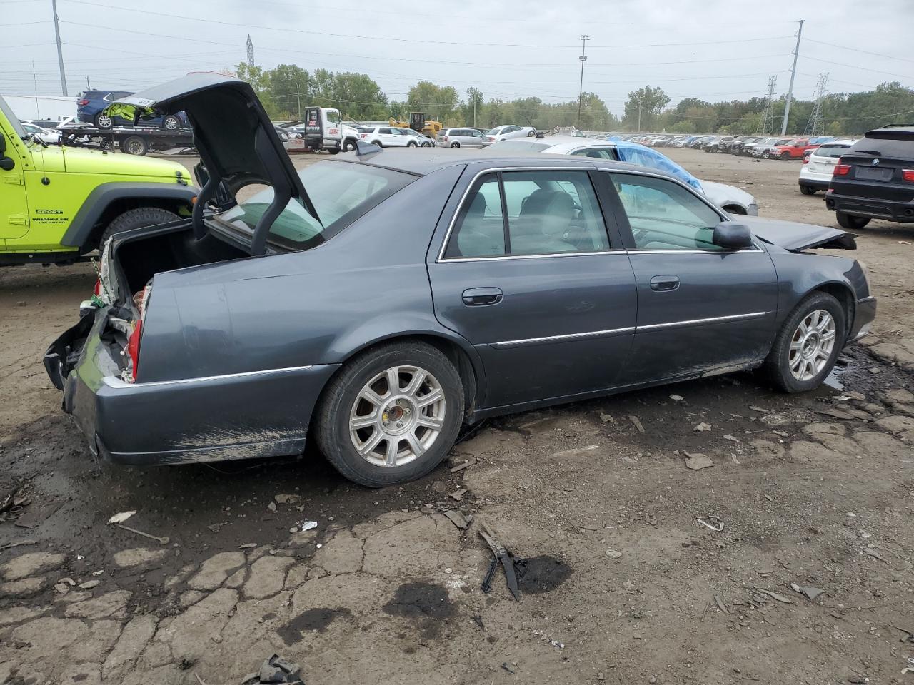 2011 Cadillac Dts VIN: 1G6KA5E60BU102879 Lot: 70845463