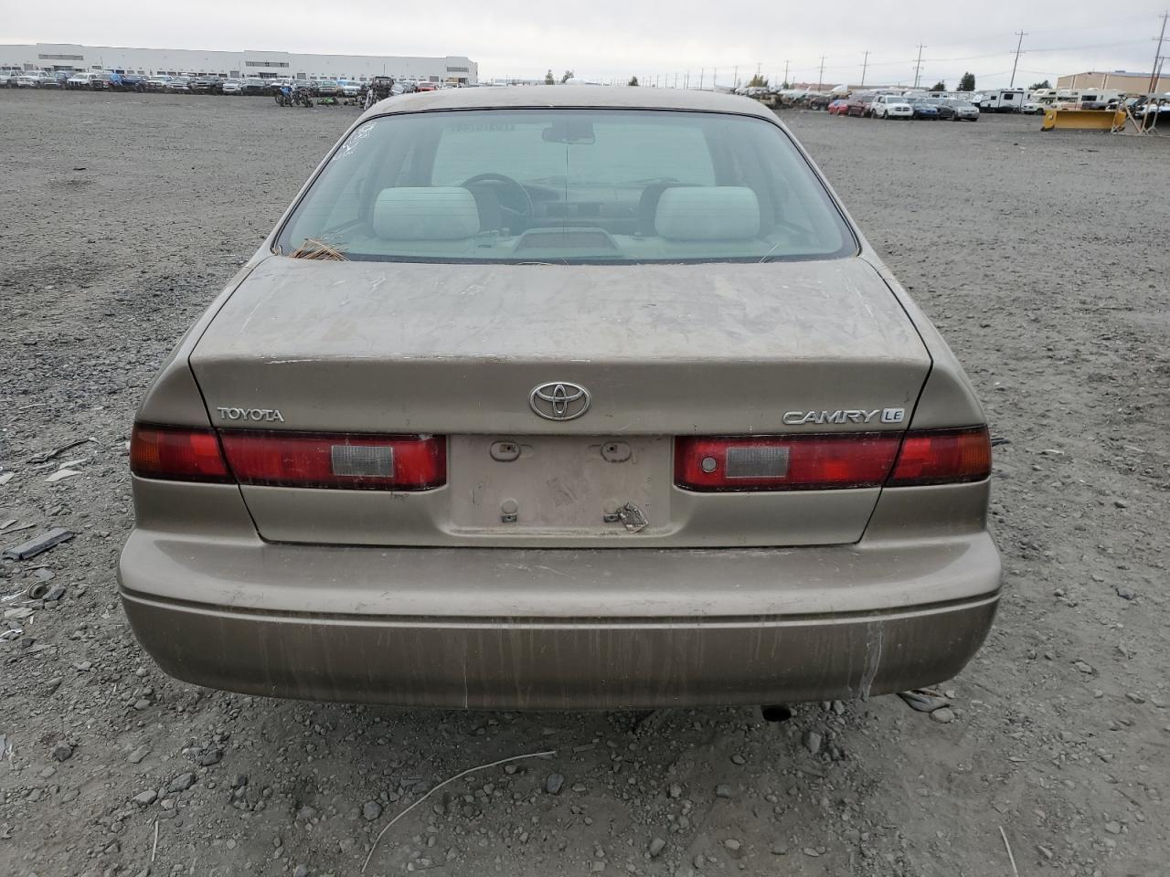 1999 Toyota Camry Le VIN: JT2BG22K0X0293349 Lot: 76976744