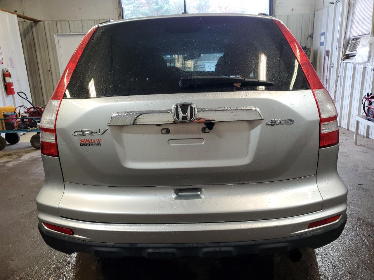 2010 Honda Cr-V Exl VIN: JHLRE4H77AC007158 Lot: 76761474