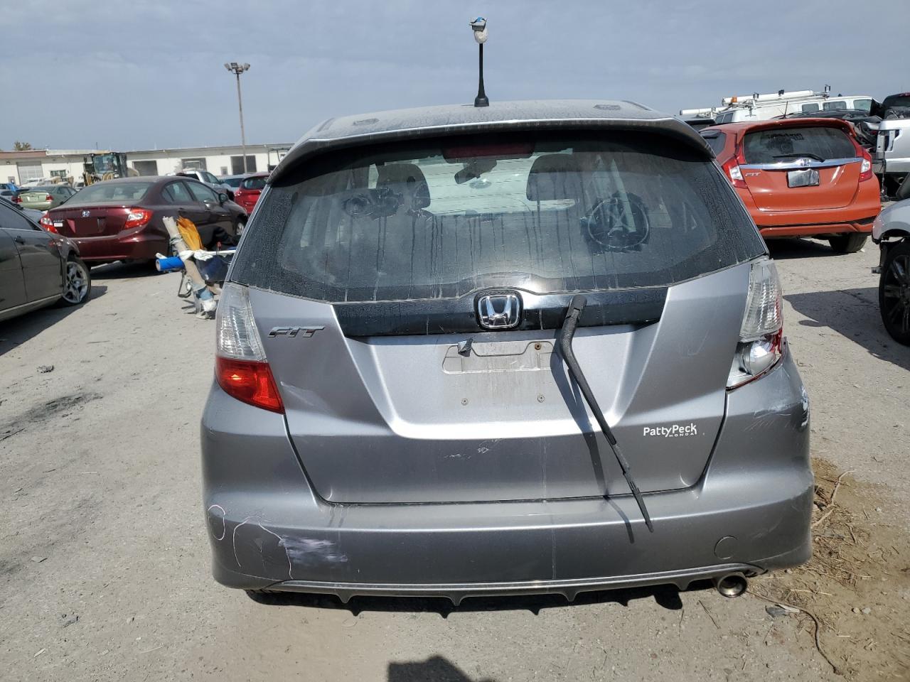 2009 Honda Fit Sport VIN: JHMGE88429S035256 Lot: 76637104