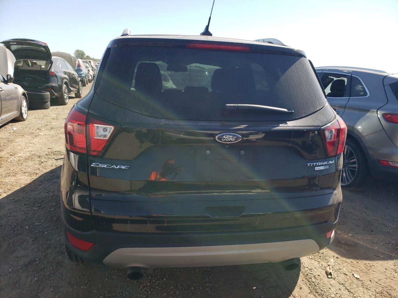 2019 Ford Escape Titanium VIN: 1FMCU9J90KUA26415 Lot: 74729584