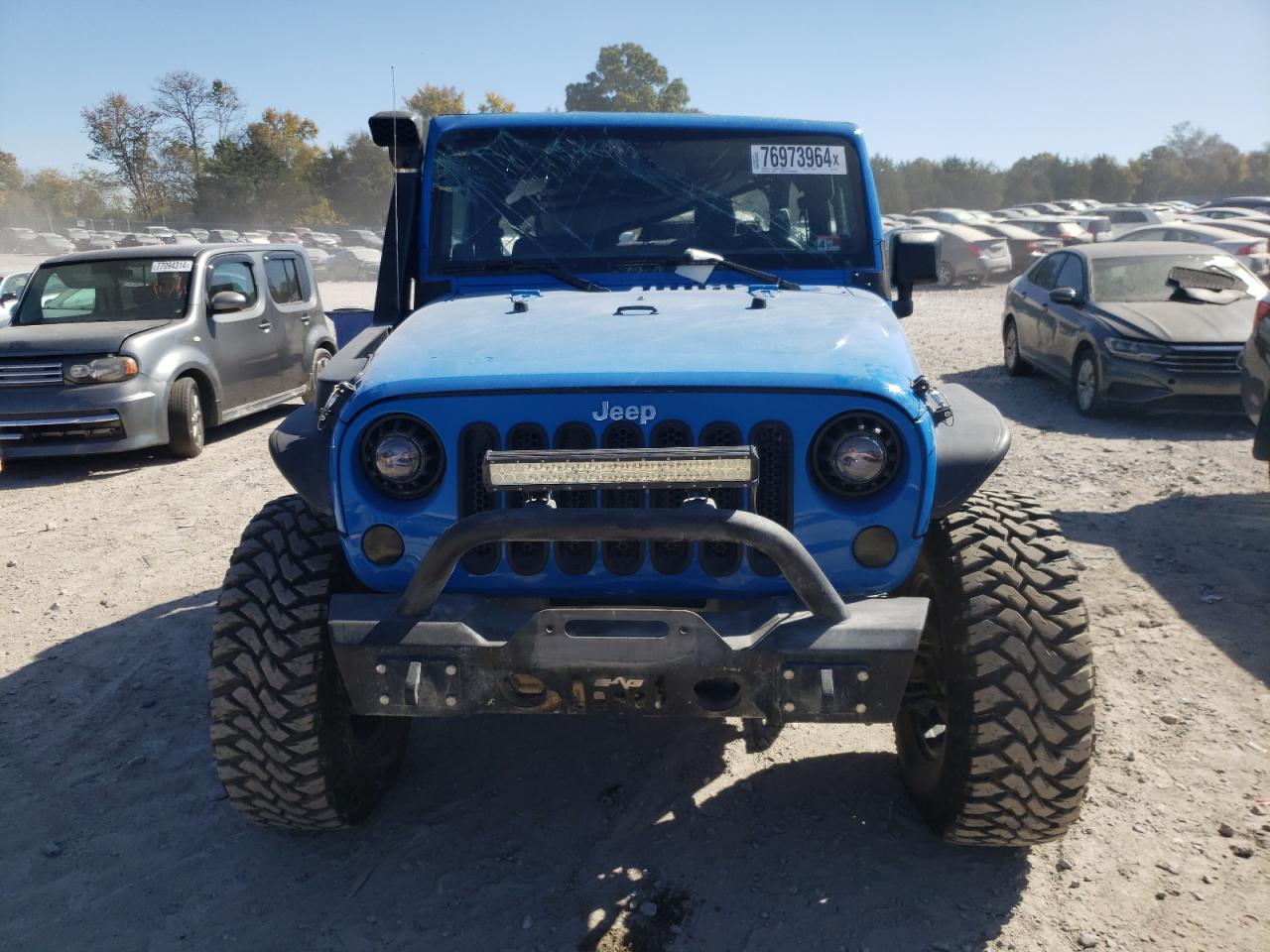 2011 Jeep Wrangler Rubicon VIN: 1J4BA6D15BL563410 Lot: 76973964