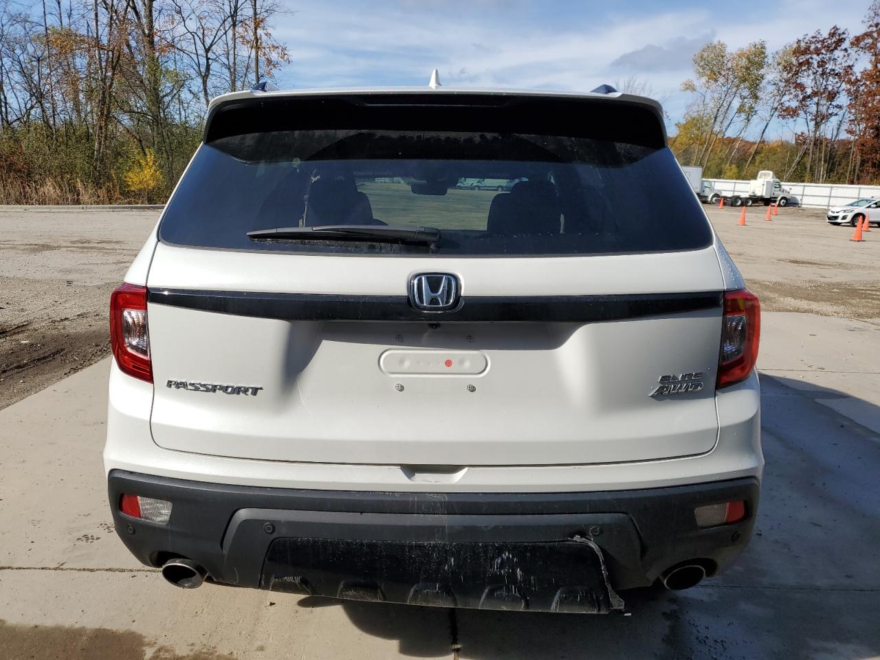 2021 Honda Passport Elite VIN: 5FNYF8H0XMB032286 Lot: 77494094