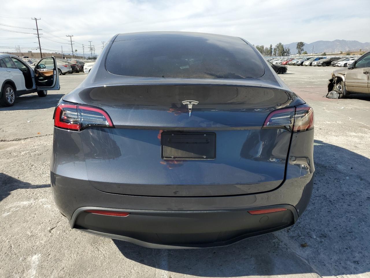 2023 Tesla Model Y VIN: 7SAYGDED8PF966337 Lot: 75775854