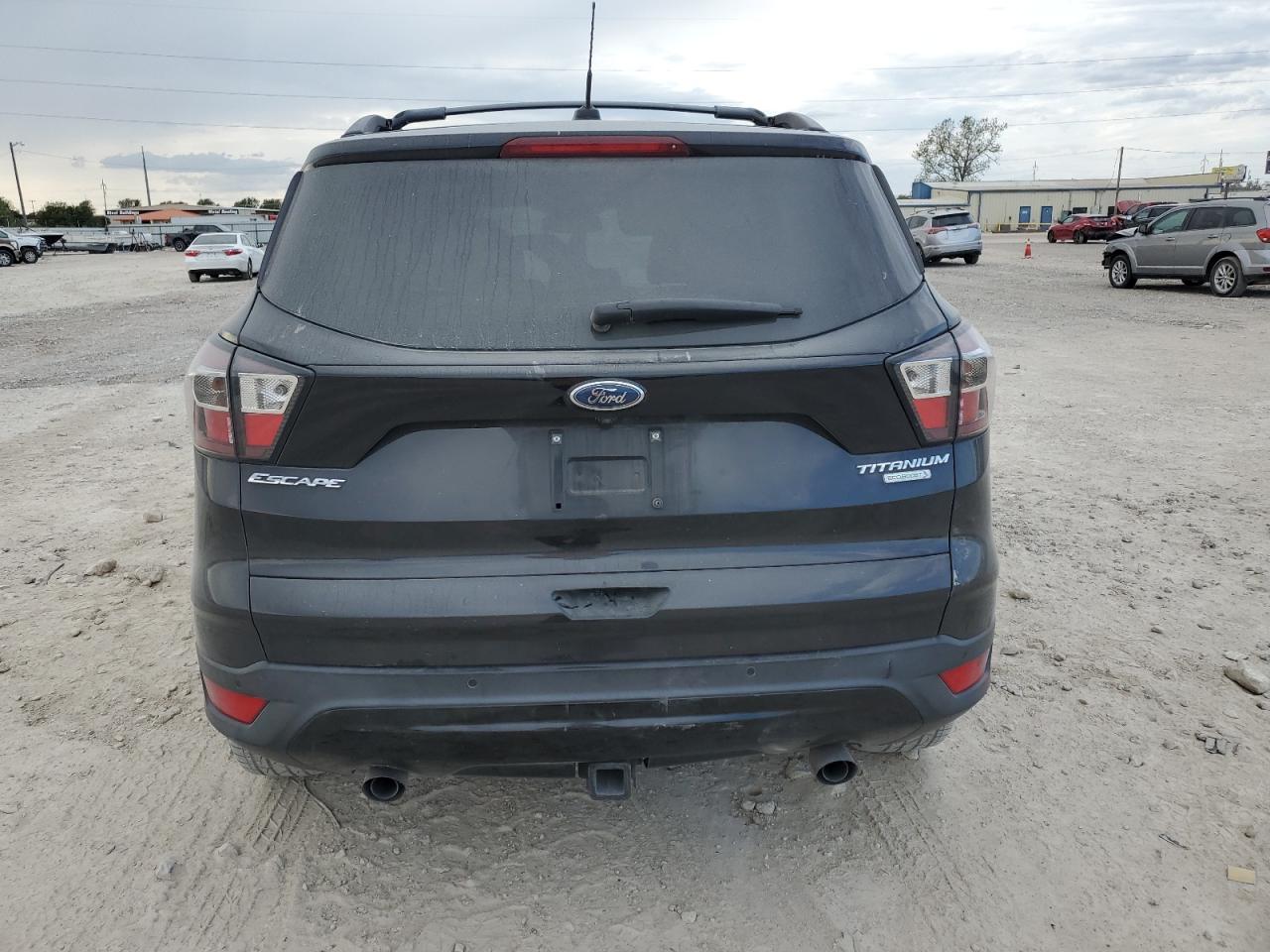 2017 Ford Escape Titanium VIN: 1FMCU0J9XHUB91523 Lot: 76909744