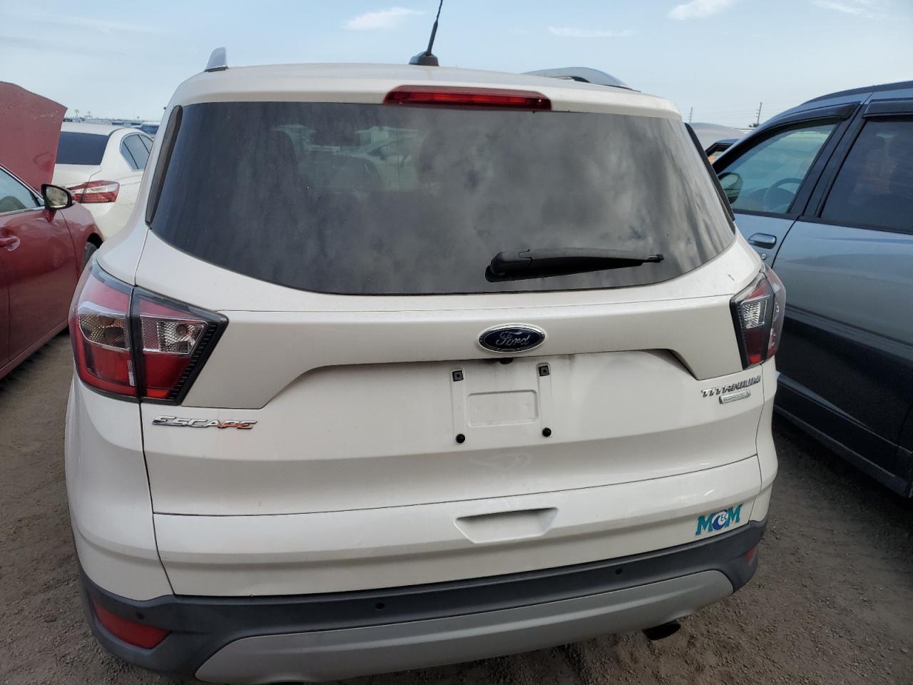 2017 Ford Escape Titanium VIN: 1FMCU0JDXHUB49356 Lot: 76177394