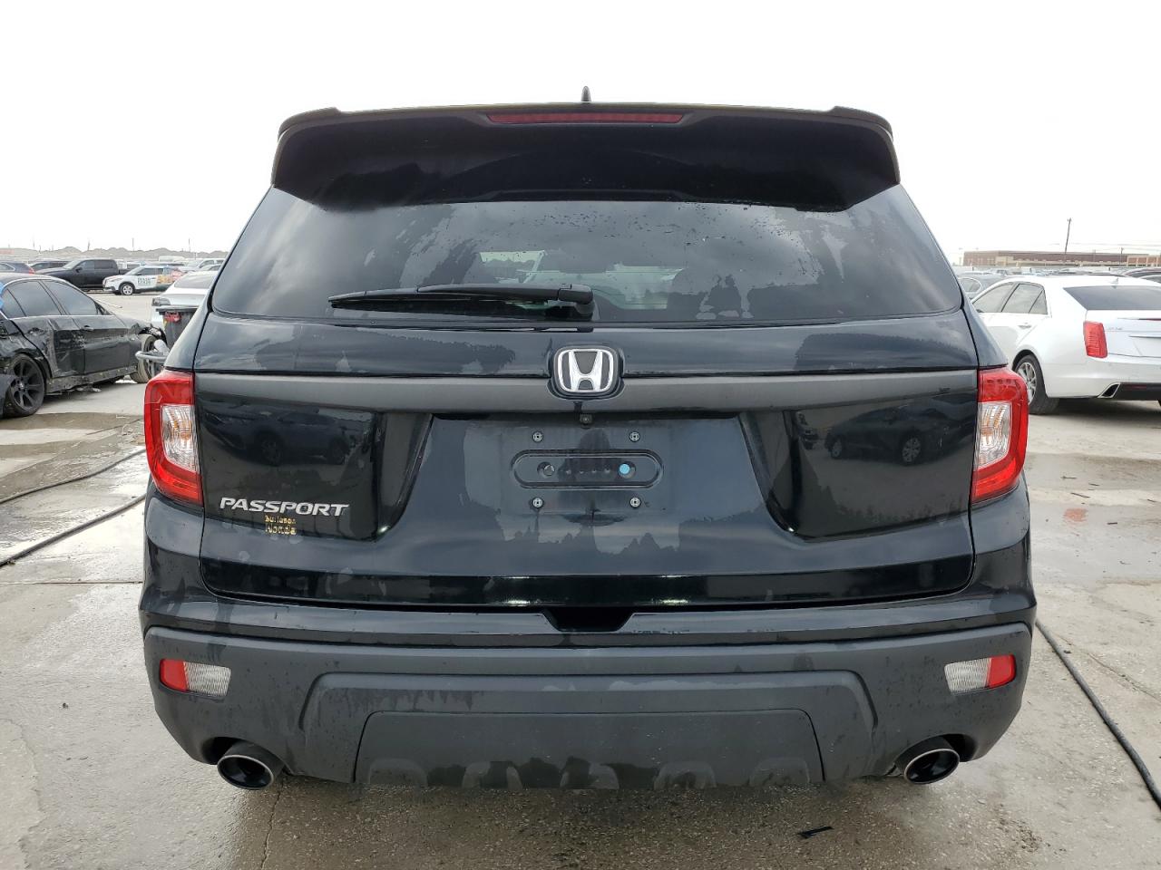 2021 Honda Passport Exl VIN: 5FNYF7H54MB000021 Lot: 75745334