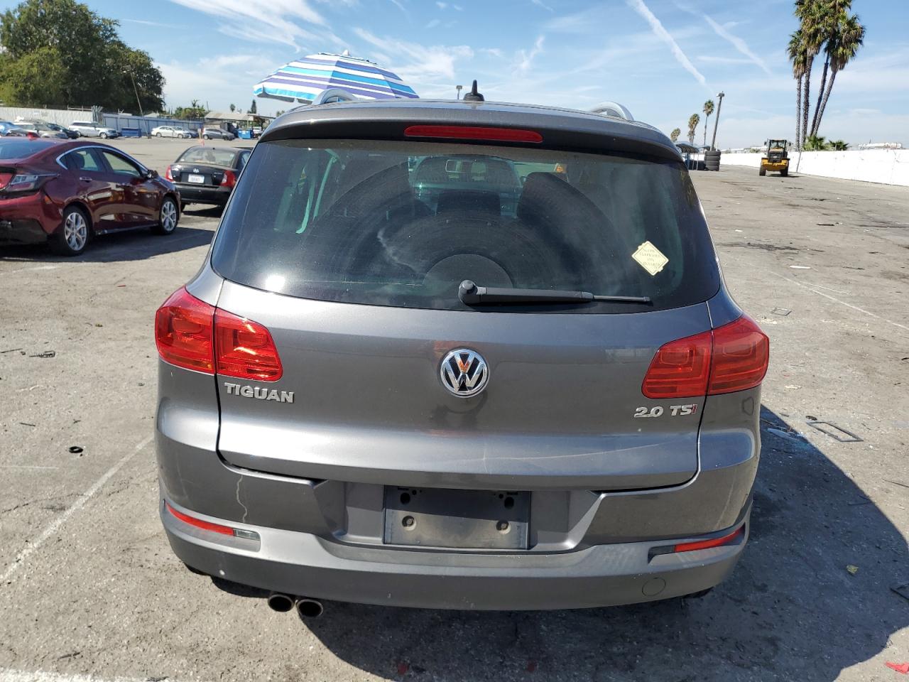 2014 Volkswagen Tiguan S VIN: WVGAV3AXXEW565438 Lot: 75694944