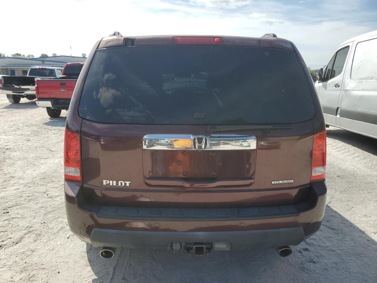 2010 Honda Pilot Touring VIN: 5FNYF3H98AB010459 Lot: 75989204