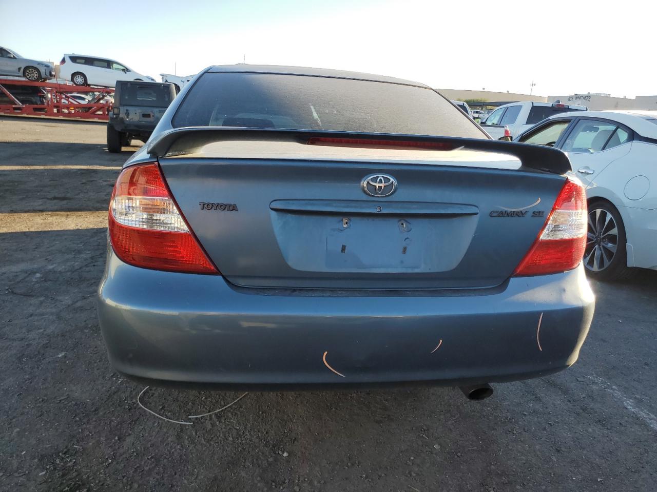 2003 Toyota Camry Le VIN: 4T1BE32K13U761168 Lot: 75441344