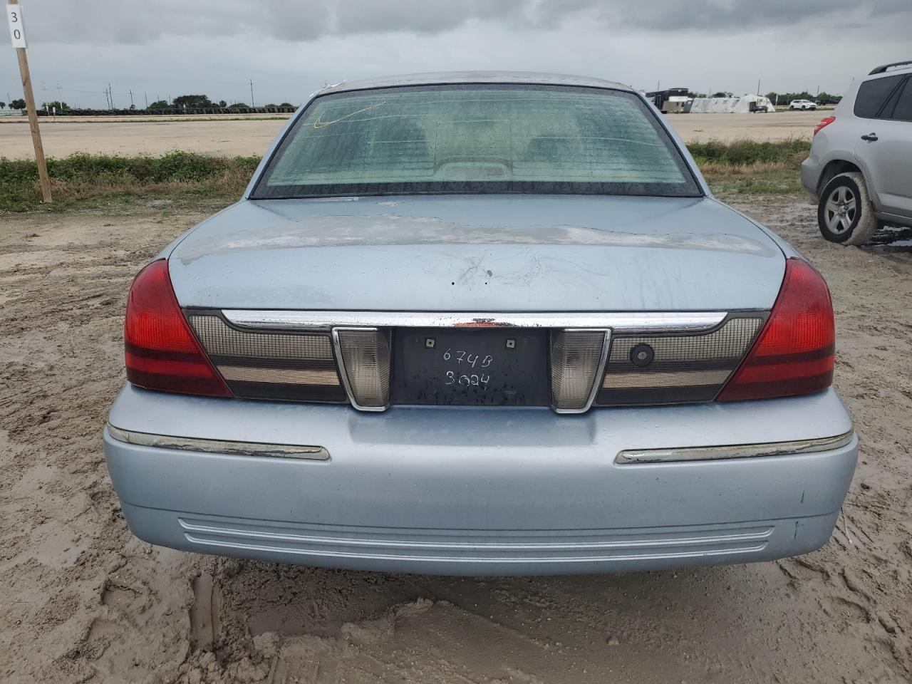 2006 Mercury Grand Marquis Gs VIN: 2MEFM74V36X613929 Lot: 74785984