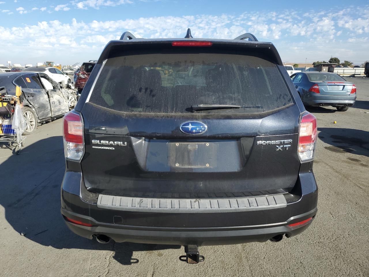 2018 Subaru Forester 2.0Xt Premium VIN: JF2SJGEC1JH444025 Lot: 77987034