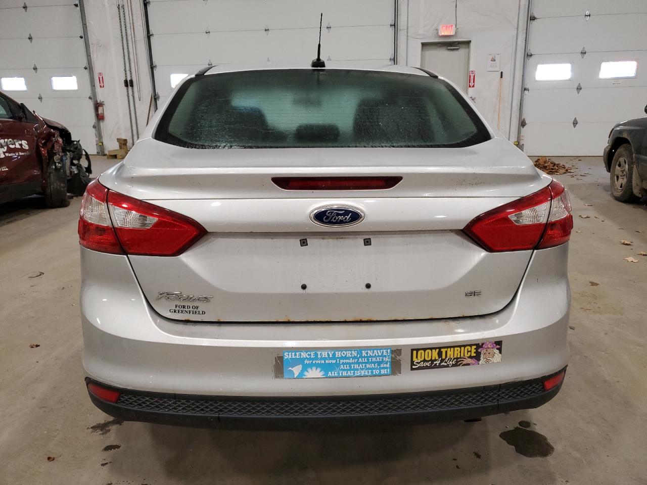 2014 Ford Focus Se VIN: 1FADP3F25EL338304 Lot: 76774104