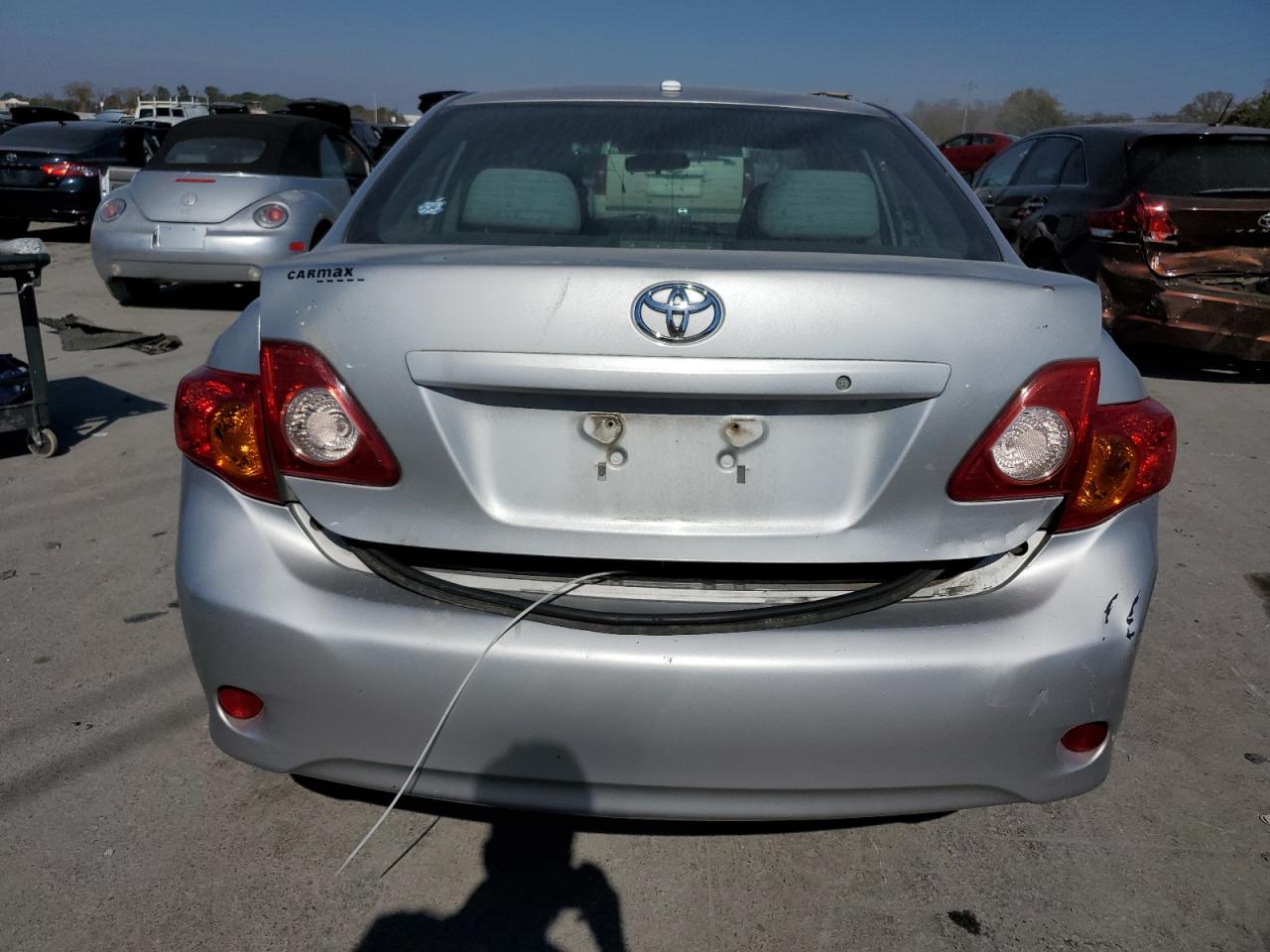 2010 Toyota Corolla Base VIN: 2T1BU4EE4AC511677 Lot: 77132074