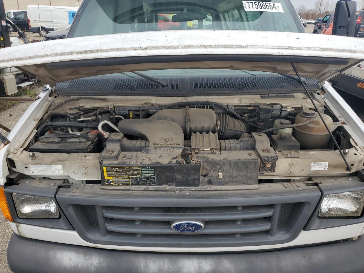 2004 Ford Econoline E350 Super Duty Van VIN: 1FTSS34L94HA96906 Lot: 77596664